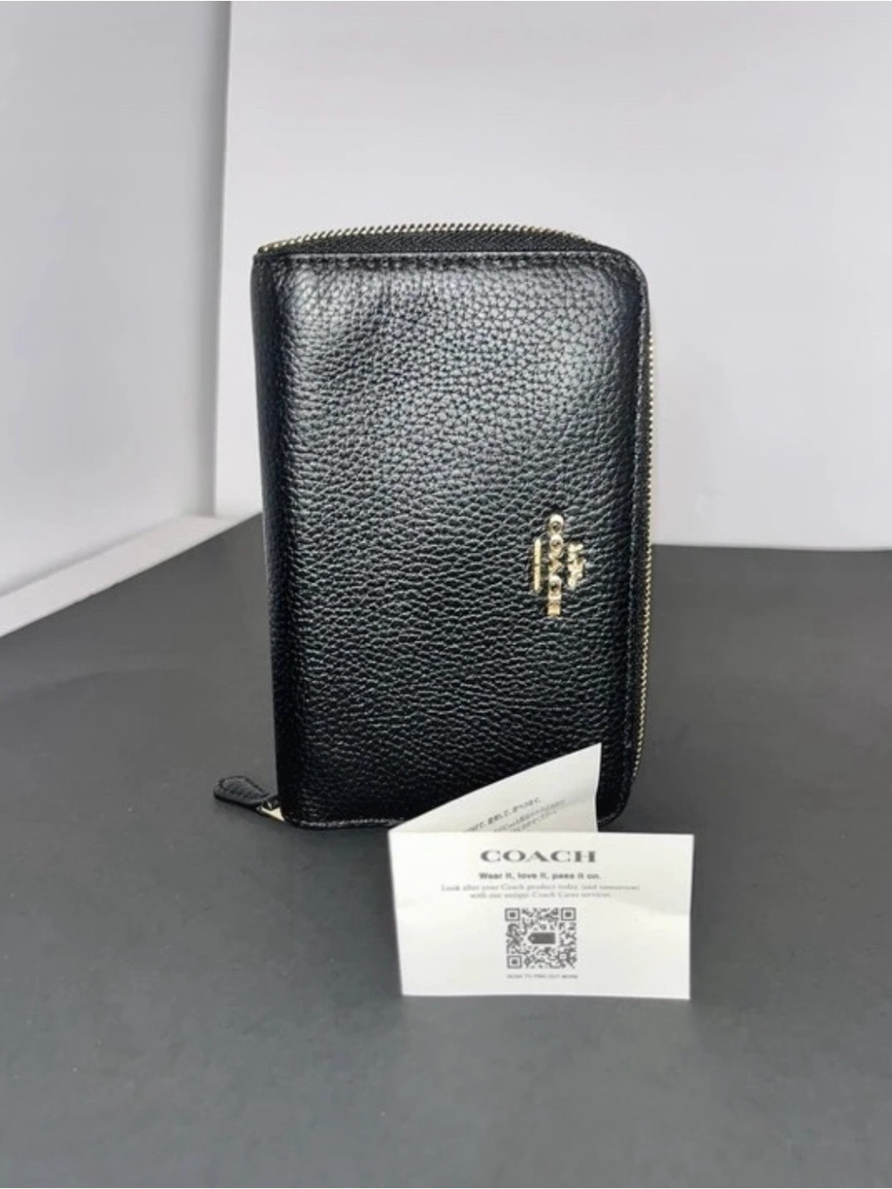 Coach Black Pebbled Leather Zip Phone Wallet with Gold Logo